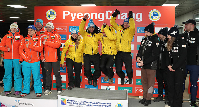 Team Germany, the winners of the Viessmann Luge Team Relay World Cup, jumps for joy on the podium at the Alpensia Sliding Center in Pyeongchang, Gangwon-do Province, on Feb. 19.